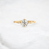 infinite-shine-round-curved-love-moissanite-engagement-ring-0-9-ct-yellow-gold-gemfora-1